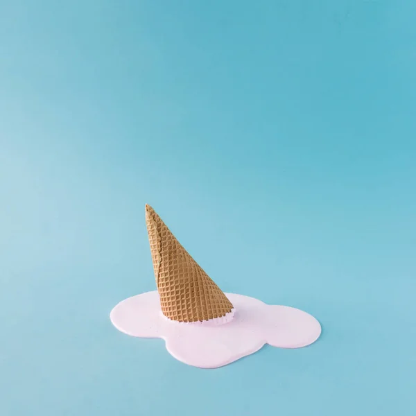Cone of spilled pink ice cream — Stock Photo, Image