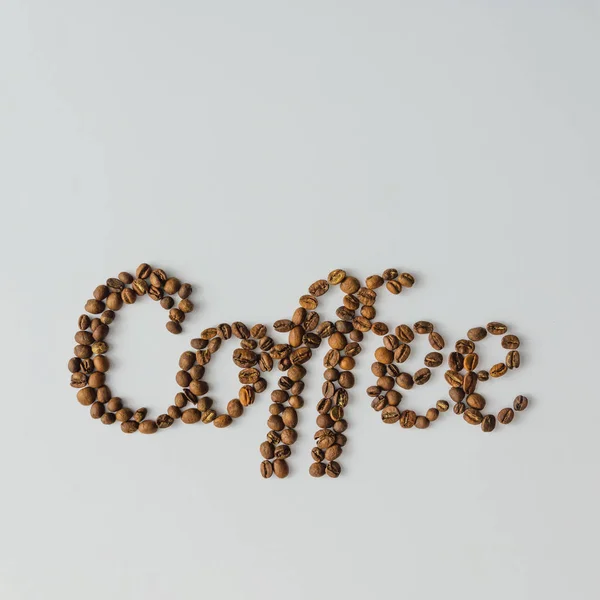 Слово Coffee Кофейных Зерен Ярком Фоне Пространством Копирования Концепция Плоского — стоковое фото