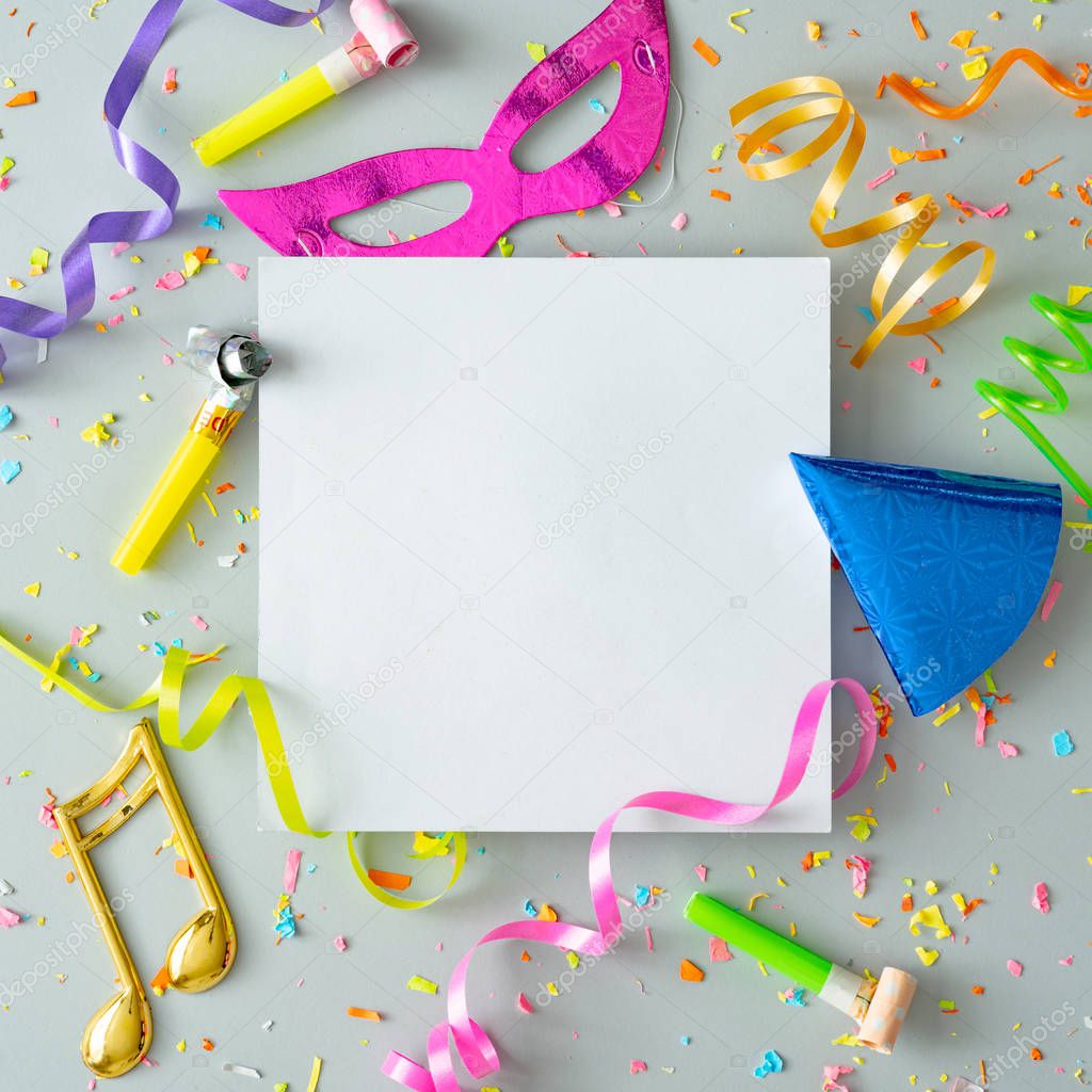 2020 year Creative composition made with party streamers and stuff with paper card note on pastel grey background. Celebration party flat lay concept.