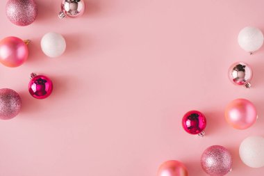 Christmas and New Year holiday background with pink Christmas decorations