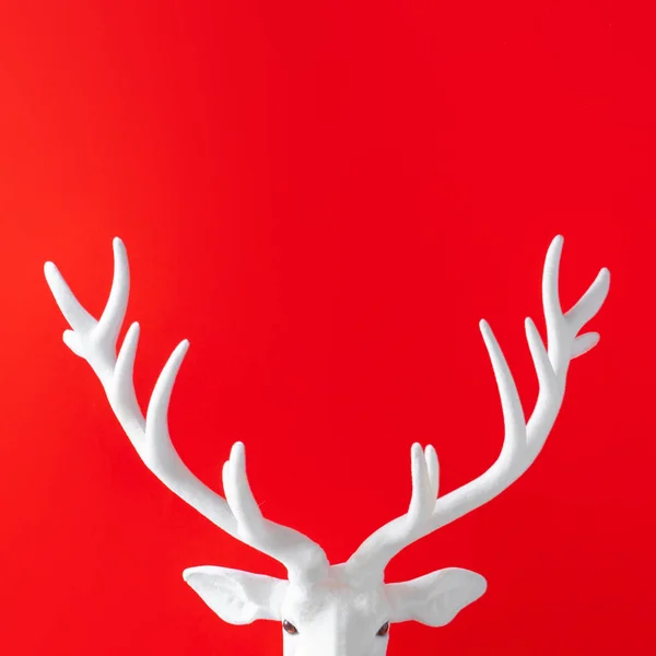 White Santa Reindeer Antlers Red Background Minimal Christmas Concept — Stock Photo, Image