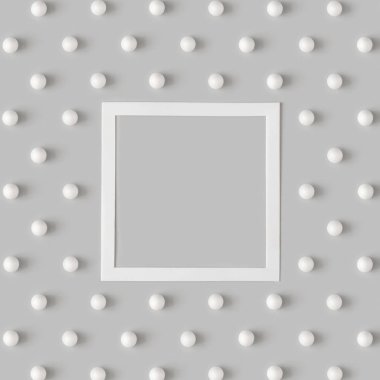Christmas pattern with card frame and snowballs on pastel gray background. Minimal holiday concept.