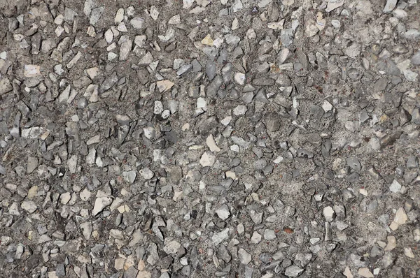 De textuur van ruw asfalt. — Stockfoto