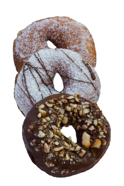 Três deliciosos donuts lado a lado no branco — Fotografia de Stock