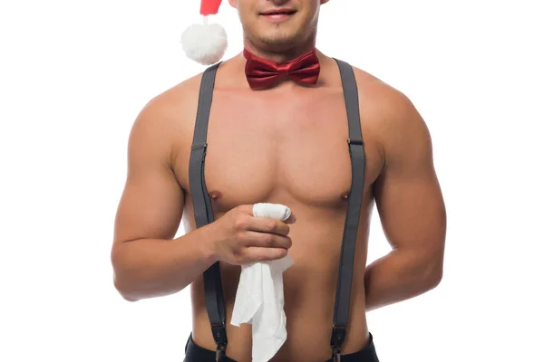 Pohledný svalnatý číšník v Santa Claus klobouk na bílém pozadí — Stock fotografie