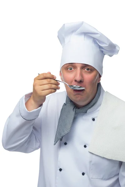 Kochlöffel schmeckt, was er gekocht hat — Stockfoto