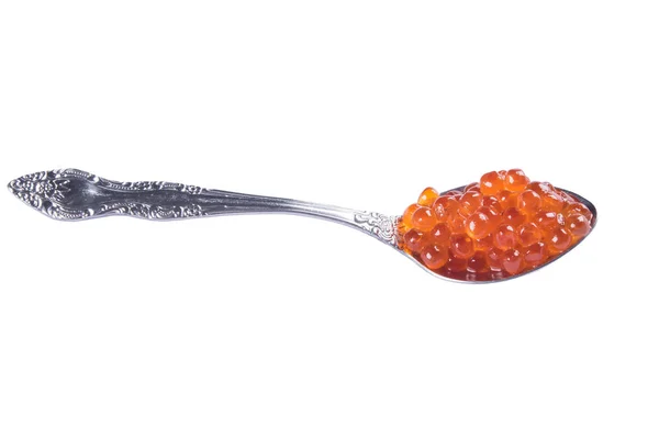 Colher de metal com caviar vermelho em um fundo branco — Fotografia de Stock