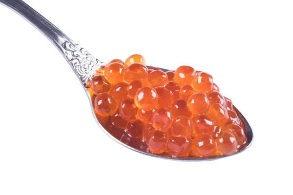 Caviar vermelho na colher no fundo branco — Fotografia de Stock