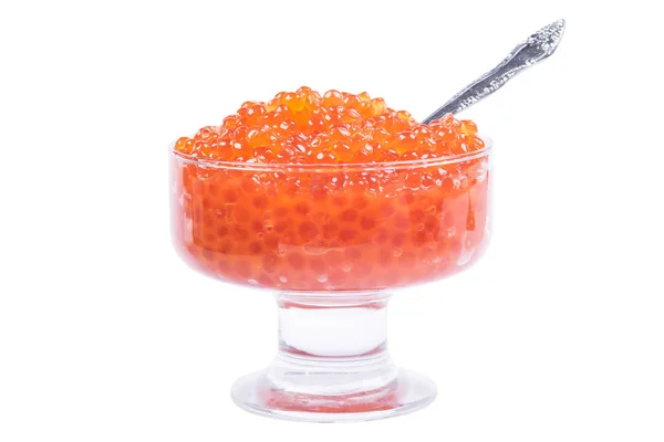 Caviar vermelho com uma corrediça e uma colher nele em um fundo branco — Fotografia de Stock