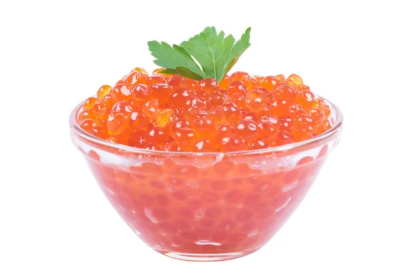 Uma porção de caviar vermelho com verdes em um fundo branco — Fotografia de Stock