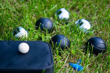 Set of balls for playing bocce on the lawn clipart