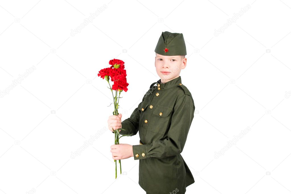 boy, in military uniform, holds a carnation, on a white background