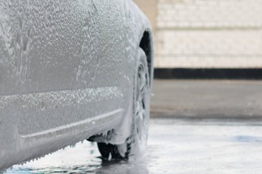 temassız köpük üzerinde bir araba yıkama, makine yakın çekim