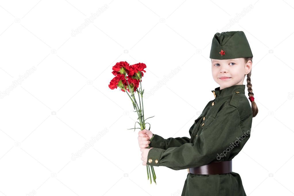 girl in military uniform holds in hands red flowers, isolated on white