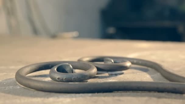 Forged metal product in the form of heart on the table — Stock Video