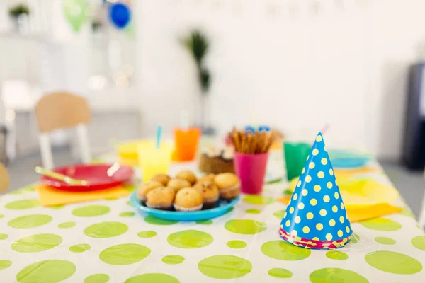 Happy birthday table concept background with cake and candle.