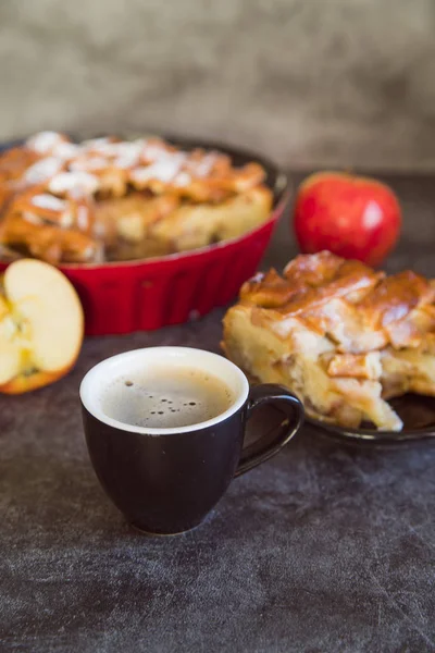 Apple pie with apples filling and rolling pin. Homemade apple pi