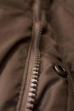 Fermuar rengi kahverengi ceket makro desenli arka plan