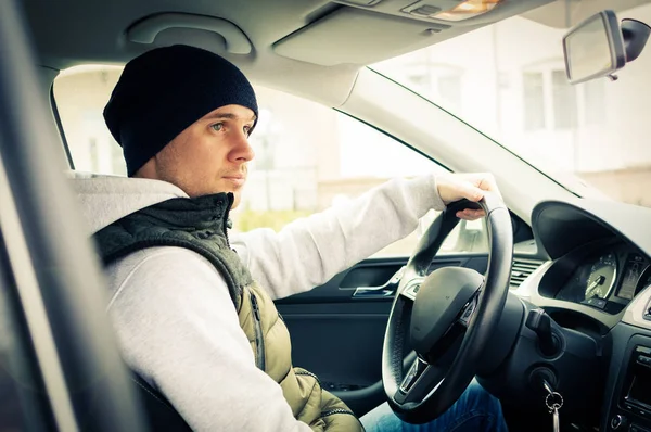 Driving safety. A young man driving a car — Stock Photo, Image