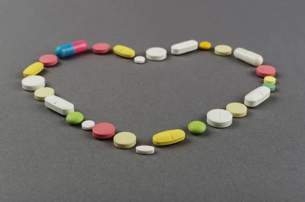 Heart created from colored pills. Medical concept — Stock Photo, Image