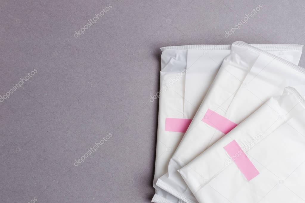 Menstruation sanitary pad for woman hygiene protection. Critical days. Medical conception