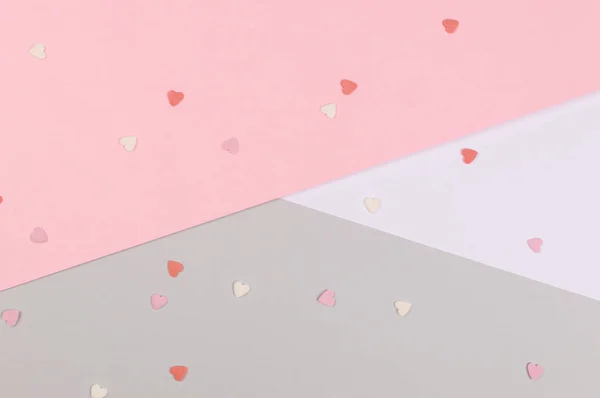 Paper flat composition with pink and grey background for Valentines day