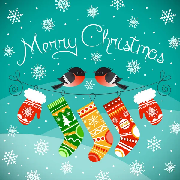 Neşeli Noel kartı. Bullfinches Noel eldiven ve çorap ile telefonda. Kar taneleri ve karlı tepelerin arka plan.