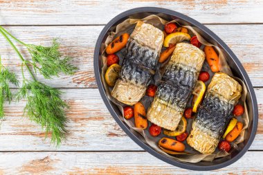 rolls-up of fillet of mackerel  with grilled vegetables clipart