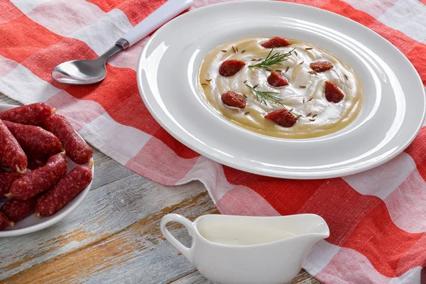 Beer and cream spicy winter Soup with Kielbasa Sausage — Stock Photo, Image