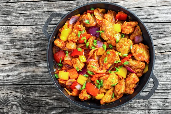 Sweet and Sour crispy fried pork pieces Stock Photo