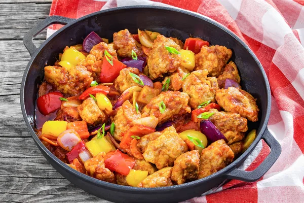 Sweet and Sour crispy fried pork pieces, close-up Royalty Free Stock Photos