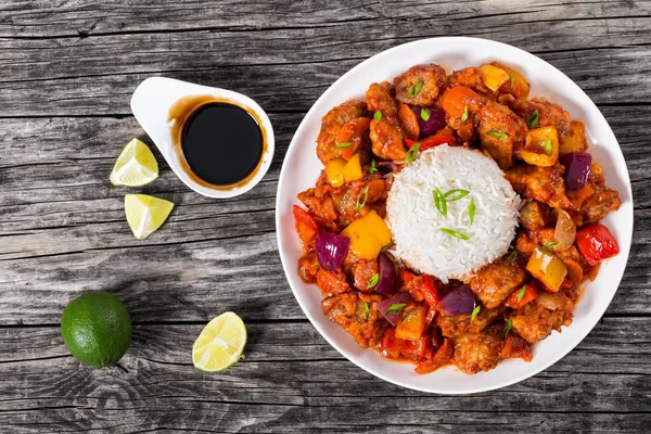 Rice with Sweet and Sour fried pork chunks Royalty Free Stock Images