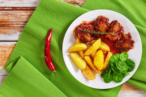 Oxtail stewed in red wine tomato sauce — Stock Image Oxtail stewed in red wine tomato sauce Royalty Free Stock Photos