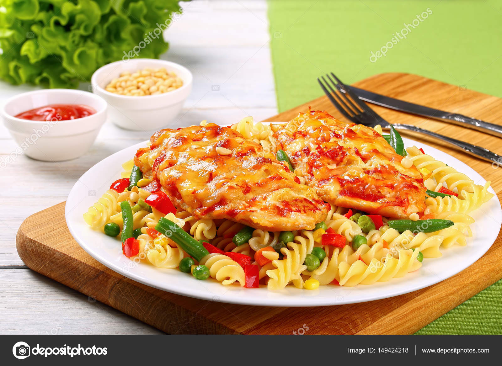 Grilled Chicken breasts and pasta on plate — Stock Photo © myviewpoint
