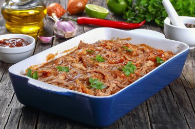 Shredded chicken meat tossed in sauce clipart