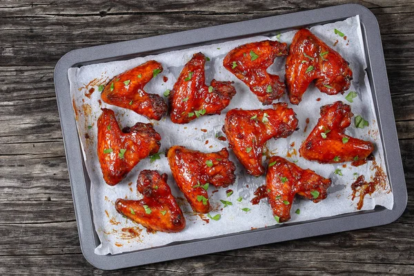 rosted chicken wings on baking sheet