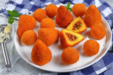 saffron rice cone stuffed with meat clipart