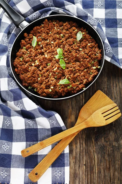 bolognese ragout in skillet, top view