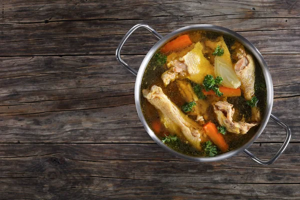 Chicken broth with pieces of meat — Stock Photo, Image