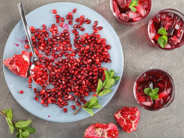 Fresh pomegranate juice in glass cups — Stock Photo, Image