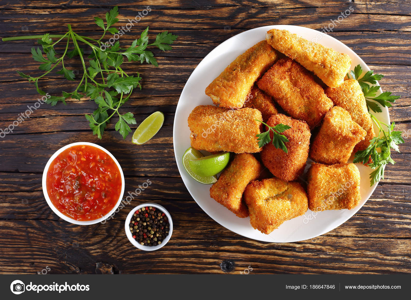 Crispy fried fish coated in batter — Stock Photo © myviewpoint 186647846
