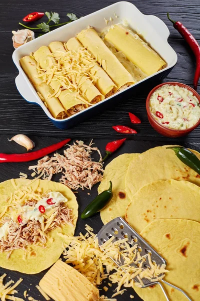 Cooking enchiladas of corn tortillas and meat — Stock Image Cooking enchiladas of corn tortillas and meat Royalty Free Stock Photos