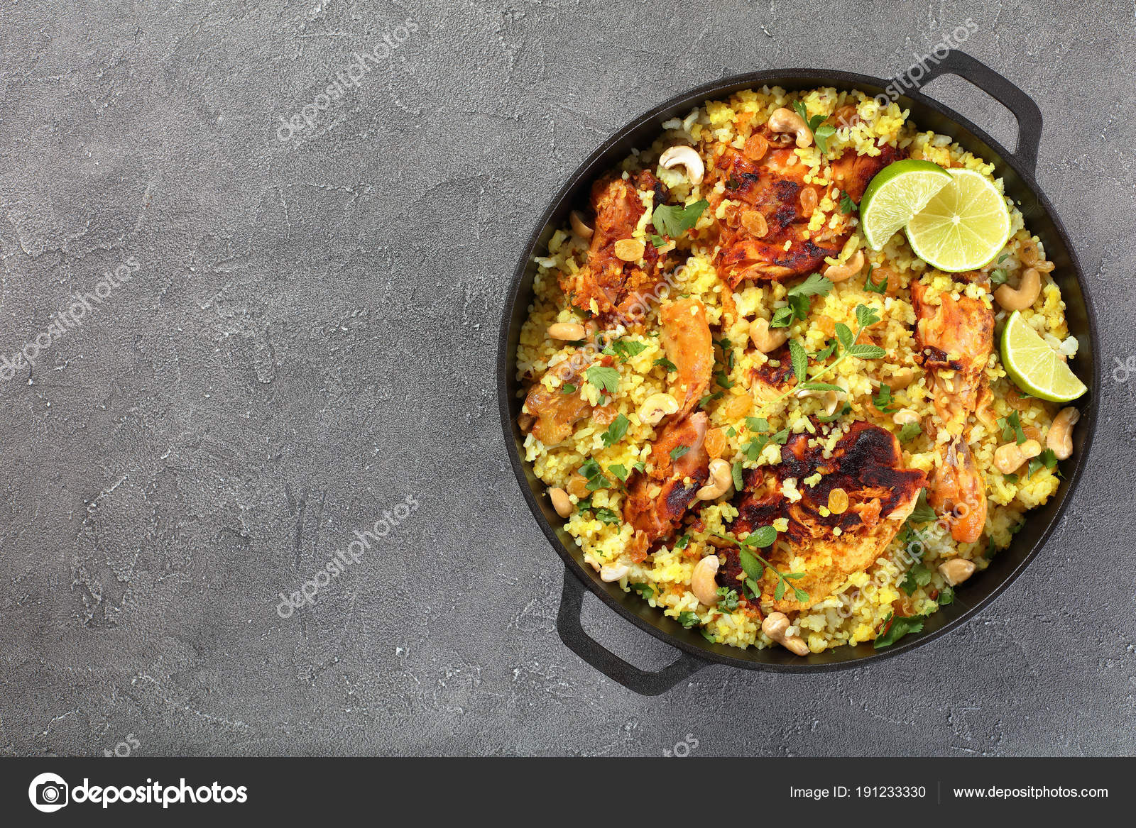 Chicken biryani n cast iron pan Stock Photo by ©myviewpoint 191233330
