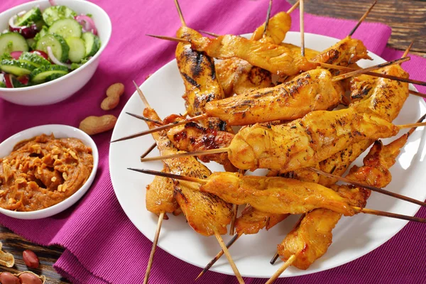 Chicken satay on skewer with sauce — Stock Photo, Image