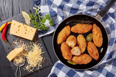meat croquettes with melted cheese filling clipart