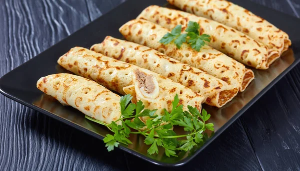 Chicken cheese pate stuffed crepes, top view — Stock Photo, Image