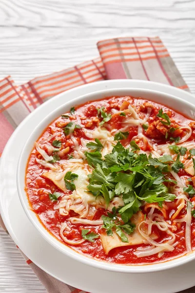 Lasagna soup with mincemeat in a white bowl — Stock Photo, Image