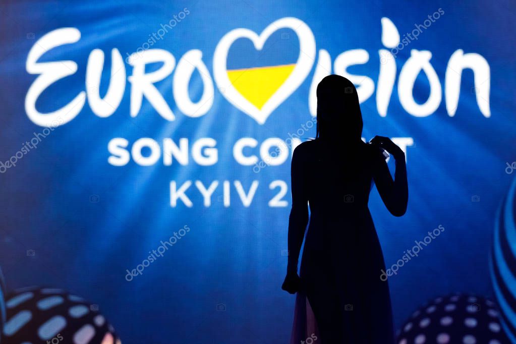 KYIV, UKRAINE - MAY 12, 2017: Demy of Greece at ESC (EUROVISION) Eurovision Song Contest 2017 during Final dress rehearsal. Silhouette on log