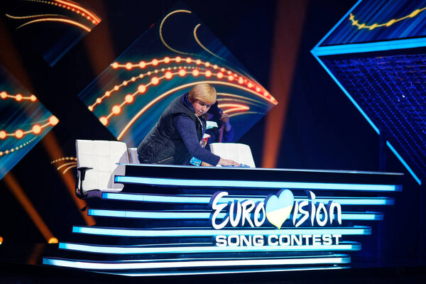 KYIV, UKRAINE - FEB 22, 2020: Staff clean the stage during ukrainian selection final of the Eurovision 2020 Song Contest