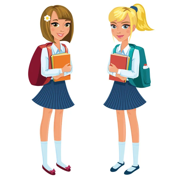 Dos colegialas felices de pie y sosteniendo libros, vista completa . — Archivo Imágenes Vectoriales